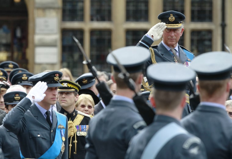 Image: ritain's Prince William and Prince Charles salute after a thanksgiving service for the 70th anniversary of the Battle of Britain in London